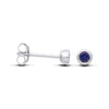 Silversmiths Sterling Silver 4mm simulated sapphire stud earrings shown from the side and front on a white background.