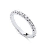 A Silversmiths sterling silver eternity ring with round cut CZ stones is displayed on a white background.