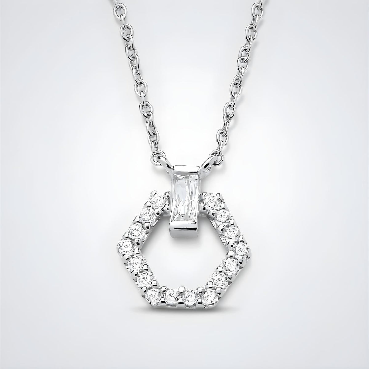 A sterling silver necklace features a hexagon pendant with a central cubic zirconia, hanging from a silver chain.