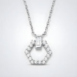 A sterling silver necklace features a hexagon pendant with a central cubic zirconia, hanging from a silver chain.