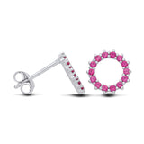 Silversmiths sterling silver stud earrings featuring a circular simulated ruby design.