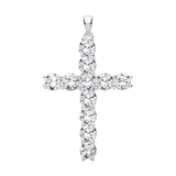 A sterling silver cross pendant with claw-set cubic zirconia is displayed against a plain white background.