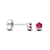 Sterling silver stud earrings with simulated ruby solitaires, shown from both the side and front angles.