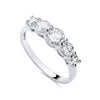 A sterling silver eternity ring with five cubic zirconia stones is shown on a plain white background.
