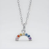 Sterling silver crescent moon necklace set with six colorful cubic zirconia gemstones.
