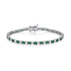 Sterling silver bracelet features 3mm simulated emeralds and cubic zirconia, displayed on a white background.