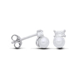 Sterling silver stud earrings with simulated pearls and baguette-cut cubic zirconia.