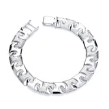 Silversmiths’ sterling silver men’s patterned cast link bracelet displayed on a plain white background.