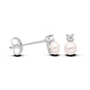 Sterling silver 4mm stud earrings featuring pearls, cubic zirconia accents, and secure butterfly backings.