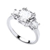 Silversmiths Sterling Silver ring featuring a cushion-cut CZ center stone and two accent stones.
