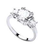 Silversmiths Sterling Silver ring featuring a cushion-cut CZ center stone and two accent stones.