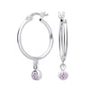 Sterling silver hoop earrings with simulated alexandrite and delicate pink stones by Silversmiths.