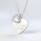 Sterling silver necklace with a heart-shaped “I Love You” charm and cubic zirconia on a fine sterling silver chain.