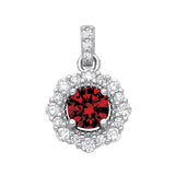Sterling silver pendant with a simulated ruby center and CZ stones in a floral halo design.