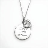 Silversmiths sterling silver necklace with a cubic zirconia heart and “Love You Mum” engraved disc charm.