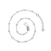 A Silversmiths sterling silver beaded rolo anklet with a 1″ extender is coiled on a plain white background.