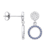 Sterling silver circle drop stud earrings with simulated sapphires and pavé sparkling accents.