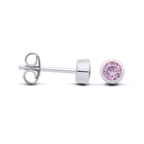 Sterling silver faceted simulated alexandrite bezel stud earrings shown from front and side on a white background.