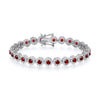A sterling silver tennis bracelet with 6.5mm simulated ruby halo stones displayed on a white background.