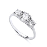 Sterling silver three-stone ring by Silversmiths features round cubic zirconia on a plain band.