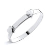 Silversmiths sterling silver expanding baby bangle featuring a double heart motif.