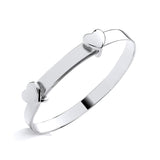 Silversmiths sterling silver expanding baby bangle featuring a double heart motif.