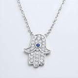 Sterling silver Hamsa necklace with simulated sapphire and cubic zirconia on a fine chain.