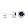 Sterling silver stud earrings with round simulated amethyst centers and clear cubic zirconia halo accents.