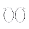 Sterling silver 22mm oval hoop earrings with latch backs, photographed on a plain white background.