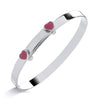 Sterling silver expanding baby bangle with pink enamel heart, heart charms, and a simple bar on a white background.