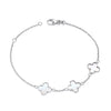 Sterling silver bracelet with three mother of pearl clover charms on a delicate, secure chain.