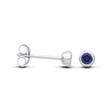 Silversmiths Sterling Silver 4mm simulated sapphire stud earrings shown from the side and front on a white background.