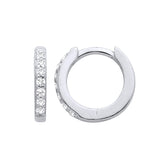 Silversmiths sterling silver huggie hoops with channel-set cubic zirconia shown from side and front angles.