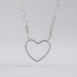 Sterling silver necklace featuring a paperclip chain and an open heart pendant by Silversmiths.
