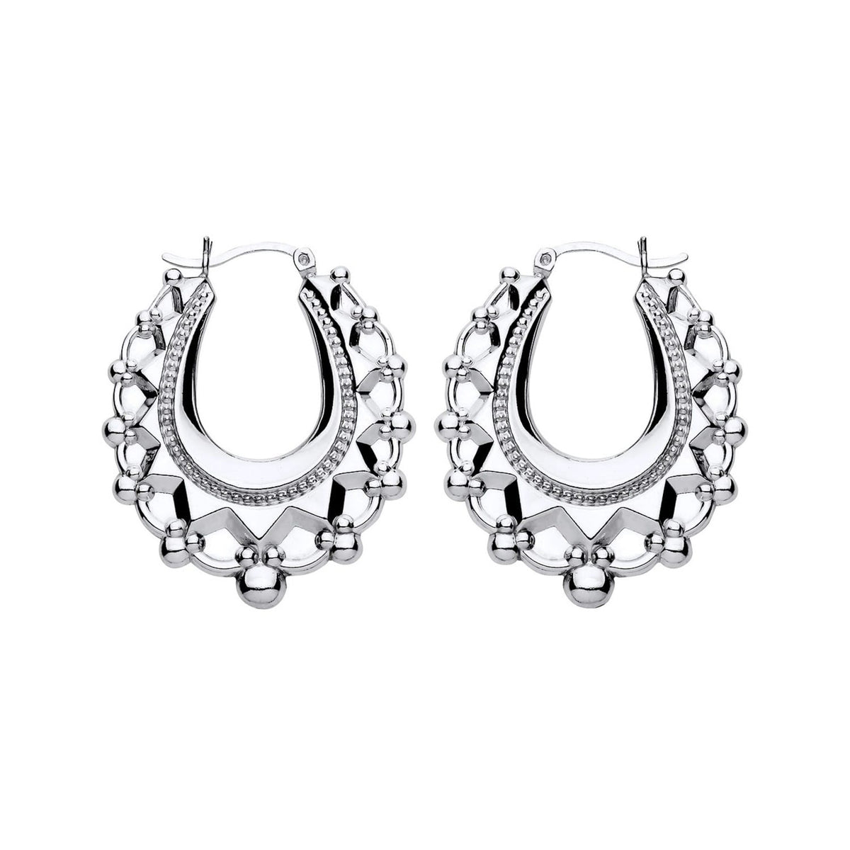 36.7mm sterling silver Gypsy Creole hoop earrings feature spiked edges and distinctive patterned detailing.