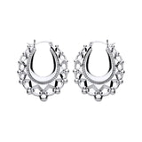 36.7mm sterling silver Gypsy Creole hoop earrings feature spiked edges and distinctive patterned detailing.