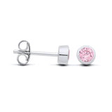 Sterling silver stud earrings with faceted simulated pink sapphires in bezel settings, front and side views.