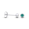 Silversmiths’ sterling silver stud earrings with 4mm simulated emeralds, shown from the front and side.