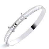 Sterling silver baby bangle from Silversmiths features heart cutouts and two bars on a reflective white background.