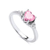 Sterling silver ring featuring a heart-shaped simulated pink sapphire and clear sparkling side accents.