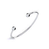 A sterling silver Maidens Torque bangle with 2.5mm round ends is displayed on a plain white background.