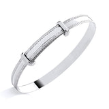 Silversmiths sterling silver expanding baby bangle with a beaded edge, suitable for stacking.