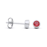 Silversmiths sterling silver stud earrings with simulated garnet, displayed front and side on a white background.