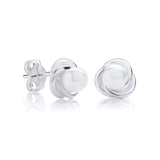 Sterling silver love knot stud earrings with simulated pearls, displayed against a white background.