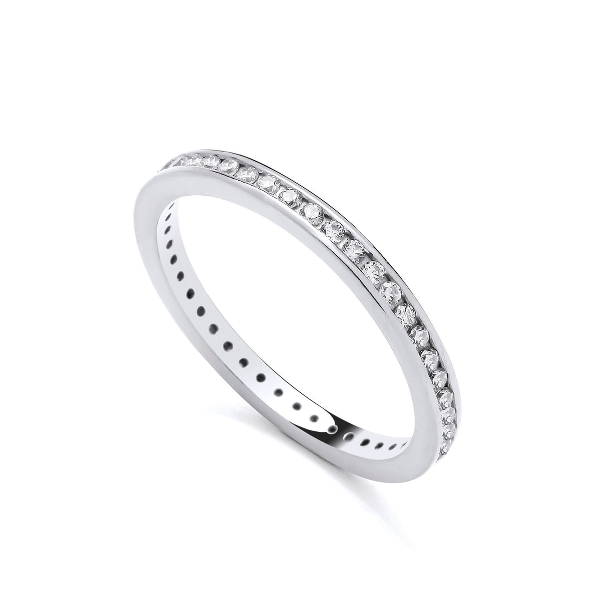 A sterling silver eternity ring by Silversmiths with round cut channel set cubic zirconia on a white background.