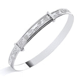 Sterling silver expanding ladies bangle with a Claddagh motif and detailed Celtic-style engravings.