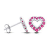 Silversmiths sterling silver stud earrings with simulated ruby heart centers and halo settings, shown front and side.