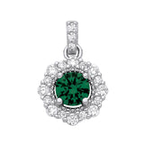 Sterling silver pendant featuring a simulated emerald center surrounded by rows of cubic zirconia.