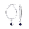 Sterling silver hoop earrings with simulated sapphire blue gemstone charms from Silversmiths.