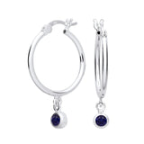 Sterling silver hoop earrings with simulated sapphire blue gemstone charms from Silversmiths.